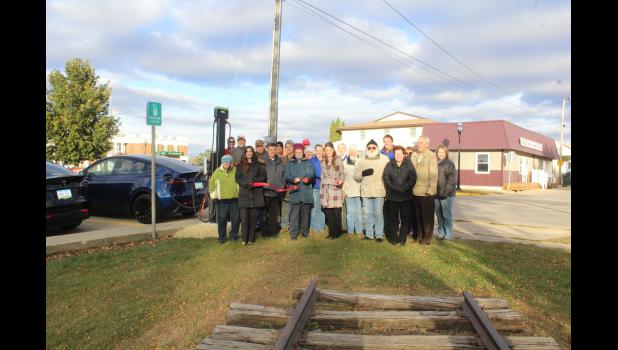 A large group of Chamber members and general public attended the ribbon-cutting ceremony of the new EV charging station at the southeast corner of Fareway’s parking lot on Oct. 17.