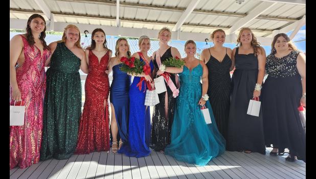 All 10 candidates stand together after the crowning of the 2024 Fair Queen and Fair Princess. From left to right: Camdyn Orth, Mackenzie Thiele, Elise Church, Emma Godman, Addalyn Isaacson, Kennedy Linkenmeyer, Kaiya Holten, Korey Hrdlicka, Kenzie Moellers, and Meredith Moore.