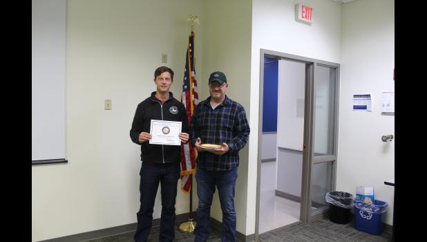 State of Iowa Auditor Rob Sand presented Howard-Winneshiek CSD a PIE (Public Innovations and Efficiencies) Award and Facilities Director Larry Trende with an apple pie for being the best performing 3A CSD in 2021.