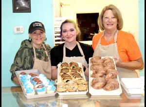 Pictured from left: Stephanie Garcia, Amber Bock and Dough & Joe Owner Molly Pedretti showcase some of the bakery's sweet treats, made fresh daily.